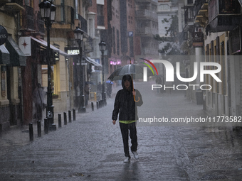 Heavy rainfall leads to significant flooding in various parts of Malaga, including major streets and public areas. (