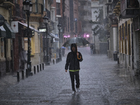 Heavy rainfall leads to significant flooding in various parts of Malaga, including major streets and public areas. (