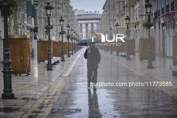 Heavy rainfall leads to significant flooding in various parts of Malaga, including major streets and public areas. 