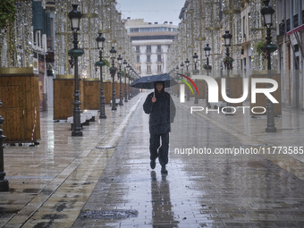 Heavy rainfall leads to significant flooding in various parts of Malaga, including major streets and public areas. (