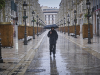 Heavy rainfall leads to significant flooding in various parts of Malaga, including major streets and public areas. (