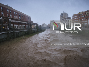 Heavy rainfall leads to significant flooding in various parts of Malaga, including major streets and public areas. (