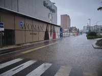 Heavy rainfall leads to significant flooding in various parts of Malaga, including major streets and public areas. (