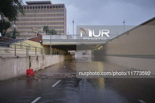 Heavy rainfall leads to significant flooding in various parts of Malaga, including major streets and public areas. 