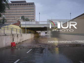 Heavy rainfall leads to significant flooding in various parts of Malaga, including major streets and public areas. (