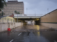 Heavy rainfall leads to significant flooding in various parts of Malaga, including major streets and public areas. (