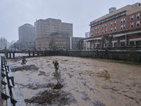 Heavy rainfall leads to significant flooding in various parts of Malaga, including major streets and public areas. (