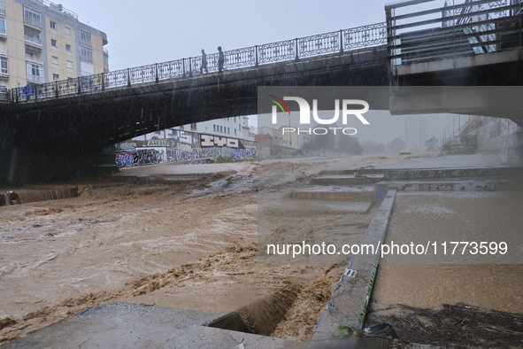 Heavy rainfall leads to significant flooding in various parts of Malaga, including major streets and public areas. 