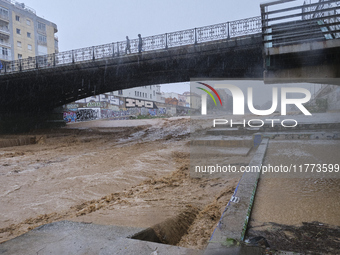 Heavy rainfall leads to significant flooding in various parts of Malaga, including major streets and public areas. (