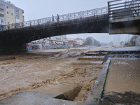 Heavy rainfall leads to significant flooding in various parts of Malaga, including major streets and public areas. (