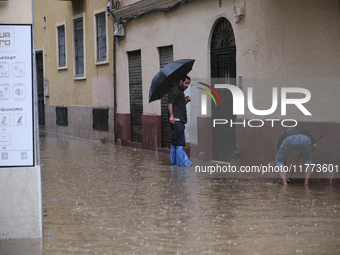 Heavy rainfall leads to significant flooding in various parts of Malaga, including major streets and public areas. (