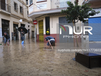 Heavy rainfall leads to significant flooding in various parts of Malaga, including major streets and public areas. (