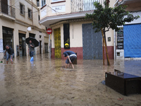 Heavy rainfall leads to significant flooding in various parts of Malaga, including major streets and public areas. (