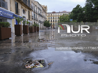 Heavy rainfall leads to significant flooding in various parts of Malaga, including major streets and public areas. (