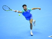 Carlos Alcaraz competes during the Nitto ATP Finals 2024 Group B match against Andrej Rublev at Inalpi Arena in Milan, Italy, on November 13...