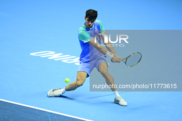 Carlos Alcaraz competes during the Nitto ATP Finals 2024 Group B match against Andrej Rublev at Inalpi Arena in Milan, Italy, on November 13...