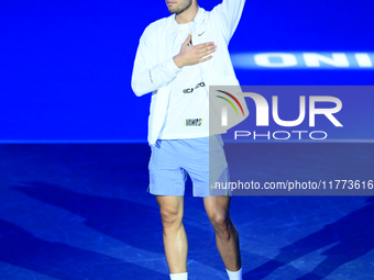 Carlos Alcaraz and Andrej Rublev compete in the Nitto ATP Finals 2024 Group B match at Inalpi Arena in Milan, Italy, on November 13, 2024. (