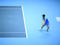 Carlos Alcaraz competes during the Nitto ATP Finals 2024 Group B match against Andrej Rublev at Inalpi Arena in Milan, Italy, on November 13...