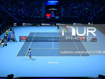 Andrej Rublev and Carlos Alcaraz compete during the Nitto ATP Finals 2024 Group B match at Inalpi Arena in Milan, Italy, on November 13, 202...