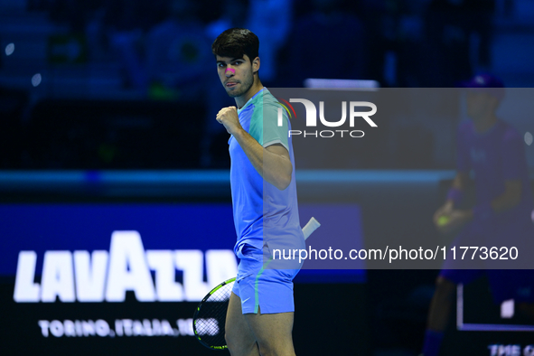 Carlos Alcaraz competes during the Nitto ATP Finals 2024 Group B match against Andrej Rublev at Inalpi Arena in Milan, Italy, on November 13...