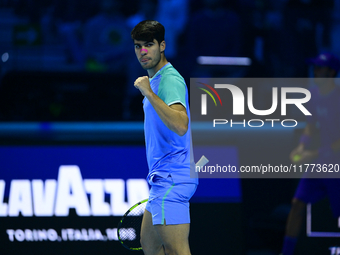 Carlos Alcaraz competes during the Nitto ATP Finals 2024 Group B match against Andrej Rublev at Inalpi Arena in Milan, Italy, on November 13...