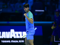 Carlos Alcaraz competes during the Nitto ATP Finals 2024 Group B match against Andrej Rublev at Inalpi Arena in Milan, Italy, on November 13...