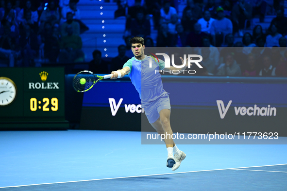 Carlos Alcaraz competes during the Nitto ATP Finals 2024 Group B match against Andrej Rublev at Inalpi Arena in Milan, Italy, on November 13...