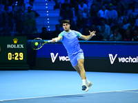 Carlos Alcaraz competes during the Nitto ATP Finals 2024 Group B match against Andrej Rublev at Inalpi Arena in Milan, Italy, on November 13...