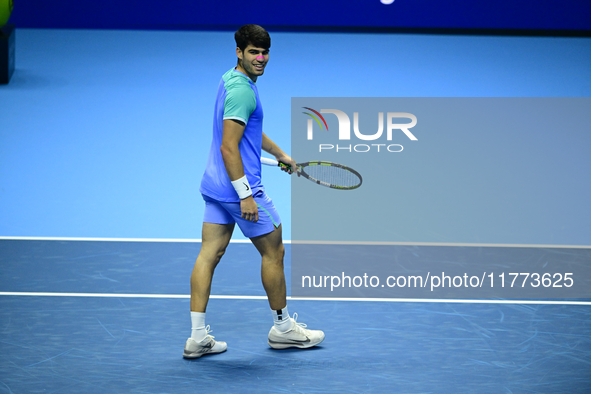 Carlos Alcaraz competes during the Nitto ATP Finals 2024 Group B match against Andrej Rublev at Inalpi Arena in Milan, Italy, on November 13...