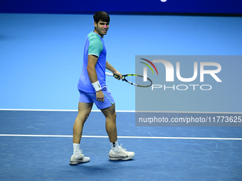 Carlos Alcaraz competes during the Nitto ATP Finals 2024 Group B match against Andrej Rublev at Inalpi Arena in Milan, Italy, on November 13...