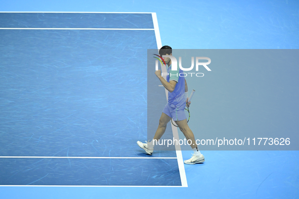 Carlos Alcaraz competes during the Nitto ATP Finals 2024 Group B match against Andrej Rublev at Inalpi Arena in Milan, Italy, on November 13...