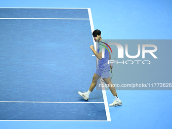 Carlos Alcaraz competes during the Nitto ATP Finals 2024 Group B match against Andrej Rublev at Inalpi Arena in Milan, Italy, on November 13...