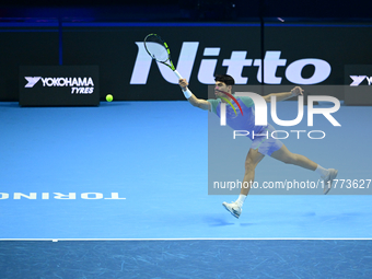 Carlos Alcaraz competes during the Nitto ATP Finals 2024 Group B match against Andrej Rublev at Inalpi Arena in Milan, Italy, on November 13...