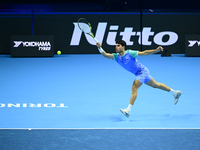 Carlos Alcaraz competes during the Nitto ATP Finals 2024 Group B match against Andrej Rublev at Inalpi Arena in Milan, Italy, on November 13...