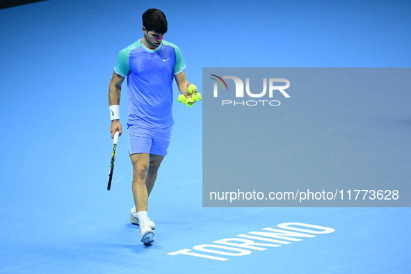 Carlos Alcaraz competes during the Nitto ATP Finals 2024 Group B match against Andrej Rublev at Inalpi Arena in Milan, Italy, on November 13...