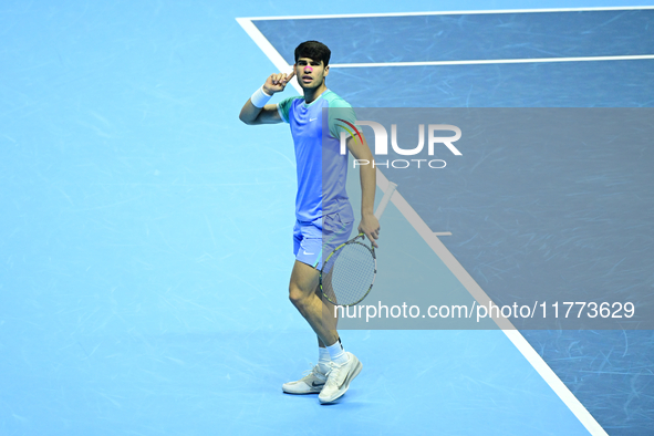 Carlos Alcaraz competes during the Nitto ATP Finals 2024 Group B match against Andrej Rublev at Inalpi Arena in Milan, Italy, on November 13...