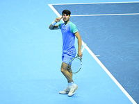 Carlos Alcaraz competes during the Nitto ATP Finals 2024 Group B match against Andrej Rublev at Inalpi Arena in Milan, Italy, on November 13...