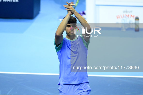 Carlos Alcaraz competes during the Nitto ATP Finals 2024 Group B match against Andrej Rublev at Inalpi Arena in Milan, Italy, on November 13...