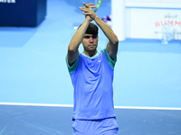 Carlos Alcaraz competes during the Nitto ATP Finals 2024 Group B match against Andrej Rublev at Inalpi Arena in Milan, Italy, on November 13...