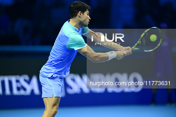 Carlos Alcaraz competes during the Nitto ATP Finals 2024 Group B match against Andrej Rublev at Inalpi Arena in Milan, Italy, on November 13...