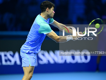 Carlos Alcaraz competes during the Nitto ATP Finals 2024 Group B match against Andrej Rublev at Inalpi Arena in Milan, Italy, on November 13...