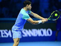 Carlos Alcaraz competes during the Nitto ATP Finals 2024 Group B match against Andrej Rublev at Inalpi Arena in Milan, Italy, on November 13...