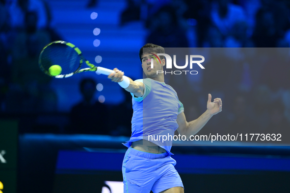 Carlos Alcaraz competes during the Nitto ATP Finals 2024 Group B match against Andrej Rublev at Inalpi Arena in Milan, Italy, on November 13...