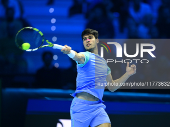 Carlos Alcaraz competes during the Nitto ATP Finals 2024 Group B match against Andrej Rublev at Inalpi Arena in Milan, Italy, on November 13...