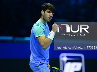 Carlos Alcaraz competes during the Nitto ATP Finals 2024 Group B match against Andrej Rublev at Inalpi Arena in Milan, Italy, on November 13...