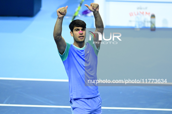 Carlos Alcaraz competes during the Nitto ATP Finals 2024 Group B match against Andrej Rublev at Inalpi Arena in Milan, Italy, on November 13...