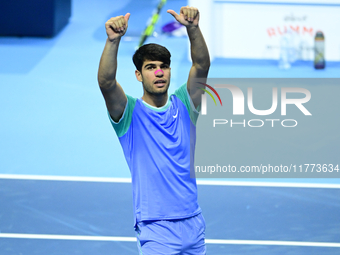 Carlos Alcaraz competes during the Nitto ATP Finals 2024 Group B match against Andrej Rublev at Inalpi Arena in Milan, Italy, on November 13...