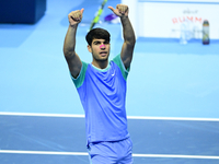 Carlos Alcaraz competes during the Nitto ATP Finals 2024 Group B match against Andrej Rublev at Inalpi Arena in Milan, Italy, on November 13...