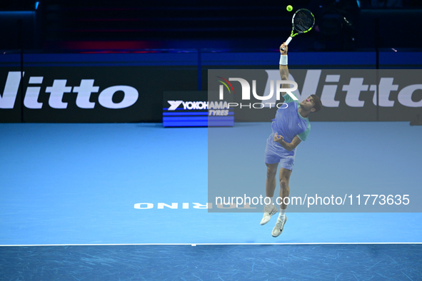 Carlos Alcaraz competes during the Nitto ATP Finals 2024 Group B match against Andrej Rublev at Inalpi Arena in Milan, Italy, on November 13...