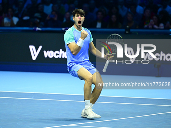 Carlos Alcaraz competes during the Nitto ATP Finals 2024 Group B match against Andrej Rublev at Inalpi Arena in Milan, Italy, on November 13...